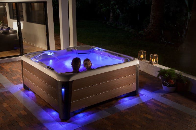 Two people in a HotSpring spa hot tub